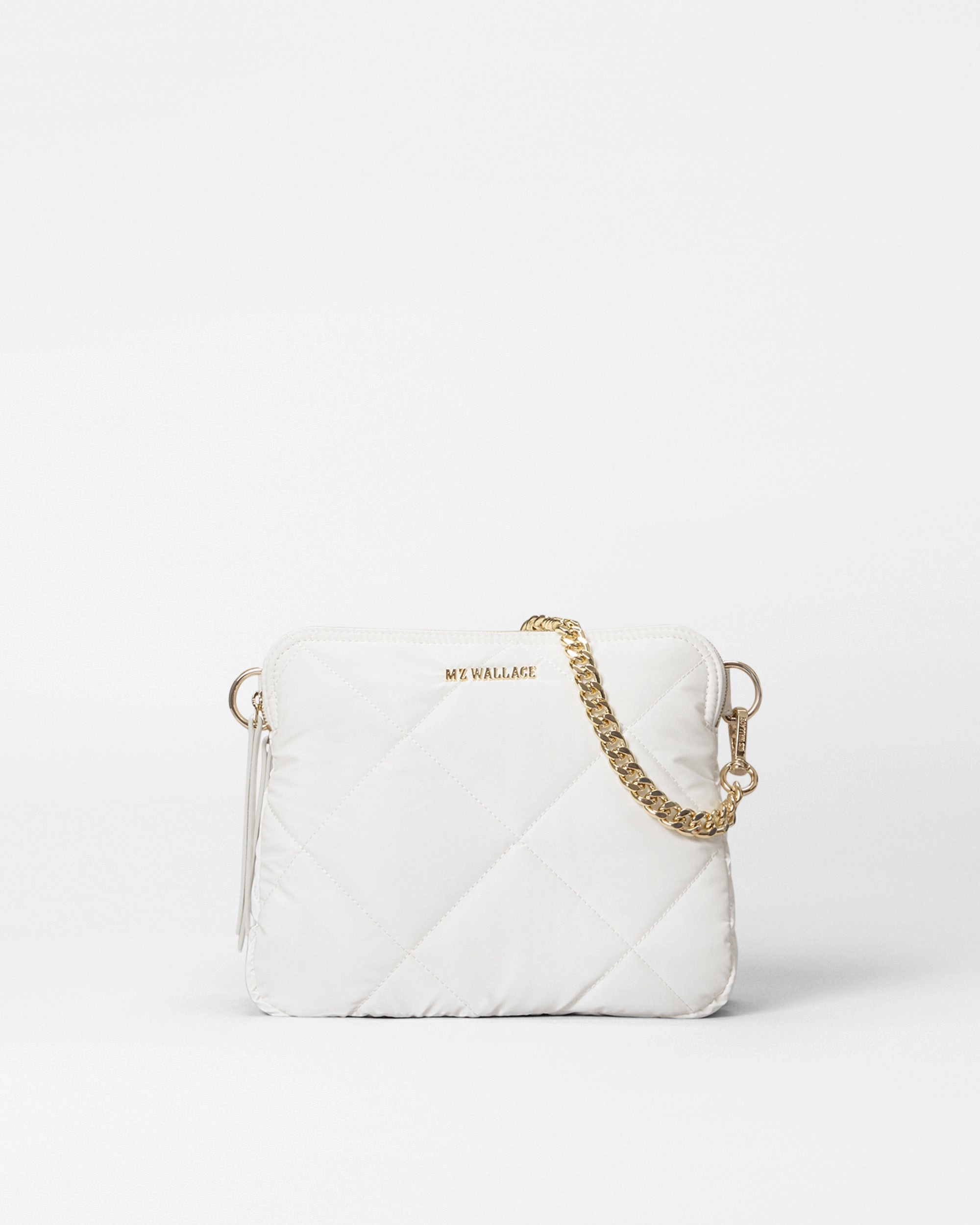 Chalk Liquid Madison Crossbody II Roomy enough to carry the essentials without being bulky Crossbody design offers hands-free convenience for busy lifestyles