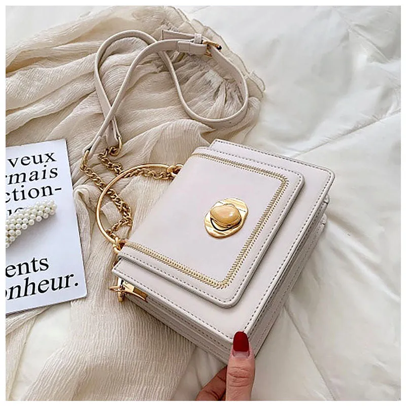 The Sabrina Handbag Minimal Identity Functional Simplicity