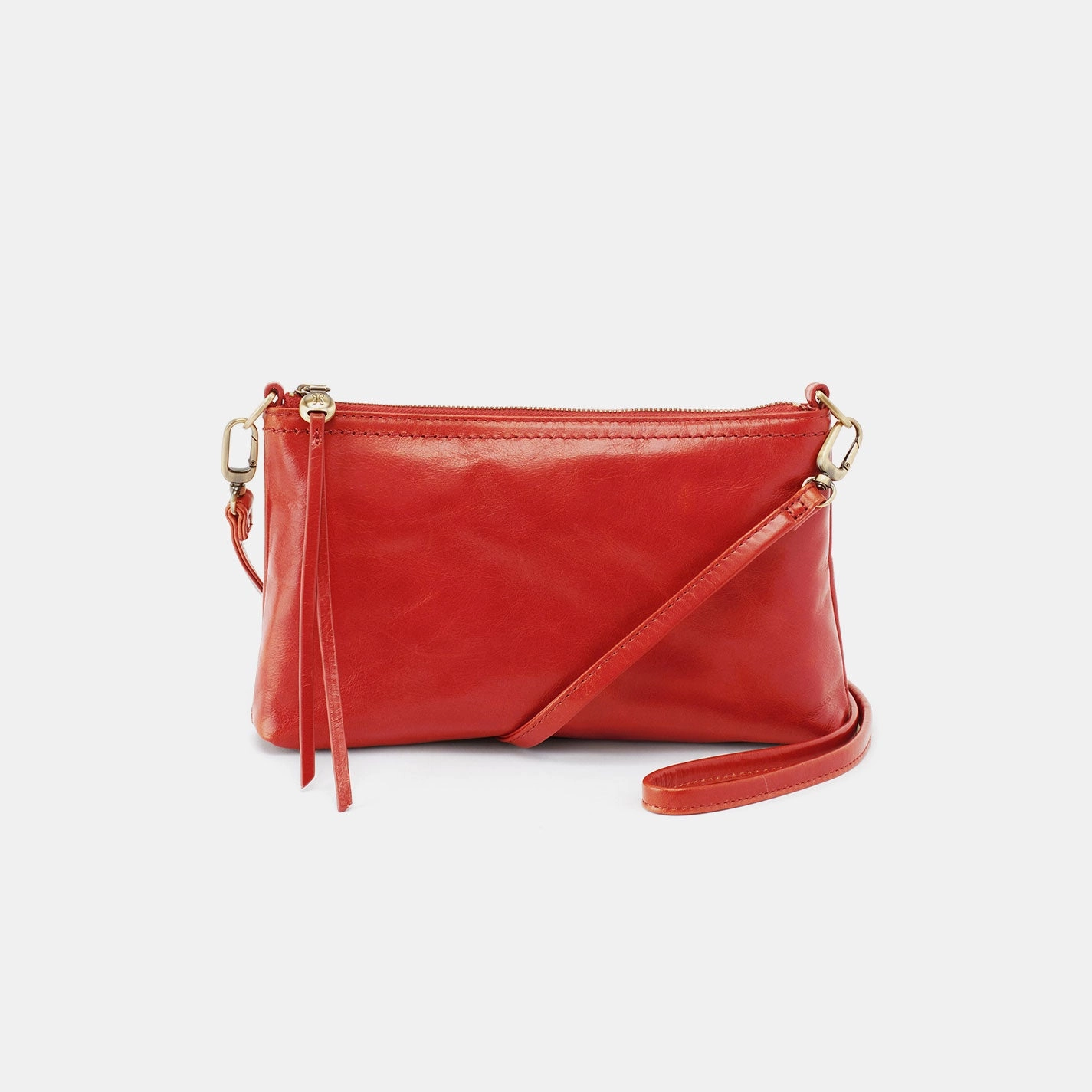 Versatile for daily use as well as travel Darcy Crossbody In Polished Leather - Grenadine