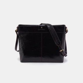 Durable materials ensure the bag can handle your daily routine Designed to be both functional and fashionable Romy Medium Crossbody in Polished Leather - Black
