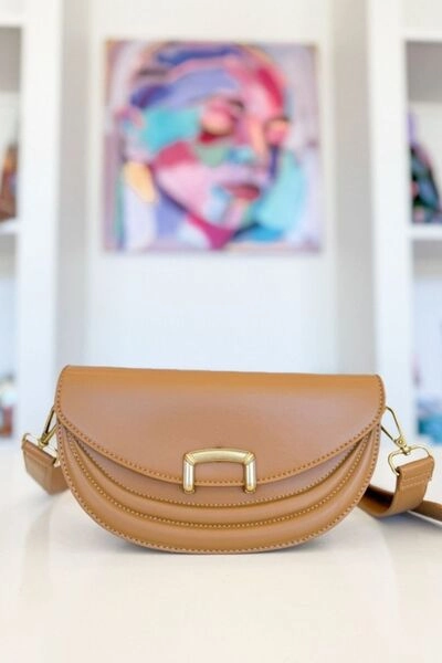 Great for anyone who prefers hands-free convenience Fame Buckle Closure Crescent Faux Leather Crossbody Bag