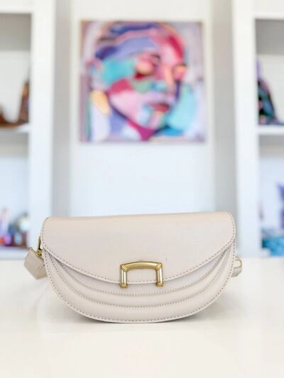 Adjustable straps for a customizable and comfortable fit Simple Everyday Fashion Fame Buckle Closure Crescent Faux Leather Crossbody Bag