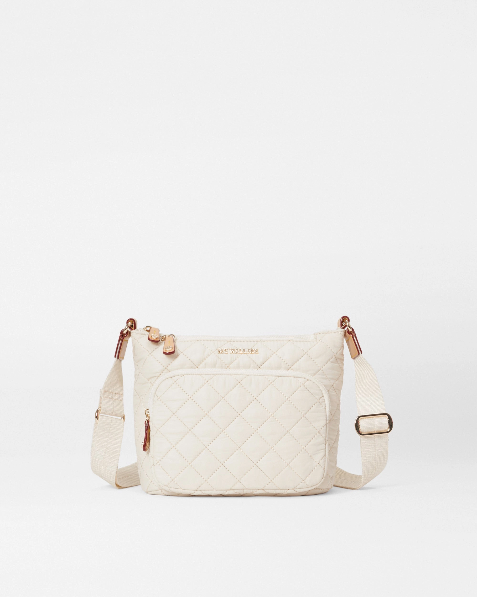Practical yet stylish solution to carry your daily essentials Sandshell Metro Scout Crossbody Deluxe