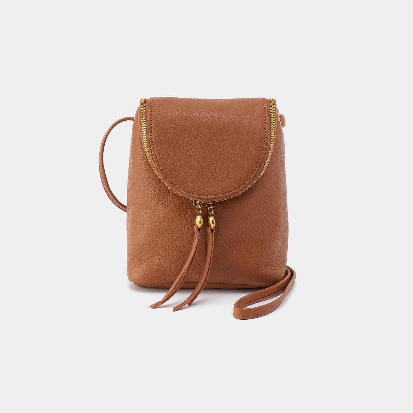 Fern Crossbody in Pebbled Leather - Warm Honey Ideal for the everyday traveler who values both comfort and convenience Smart and efficient compartments to keep you organized
