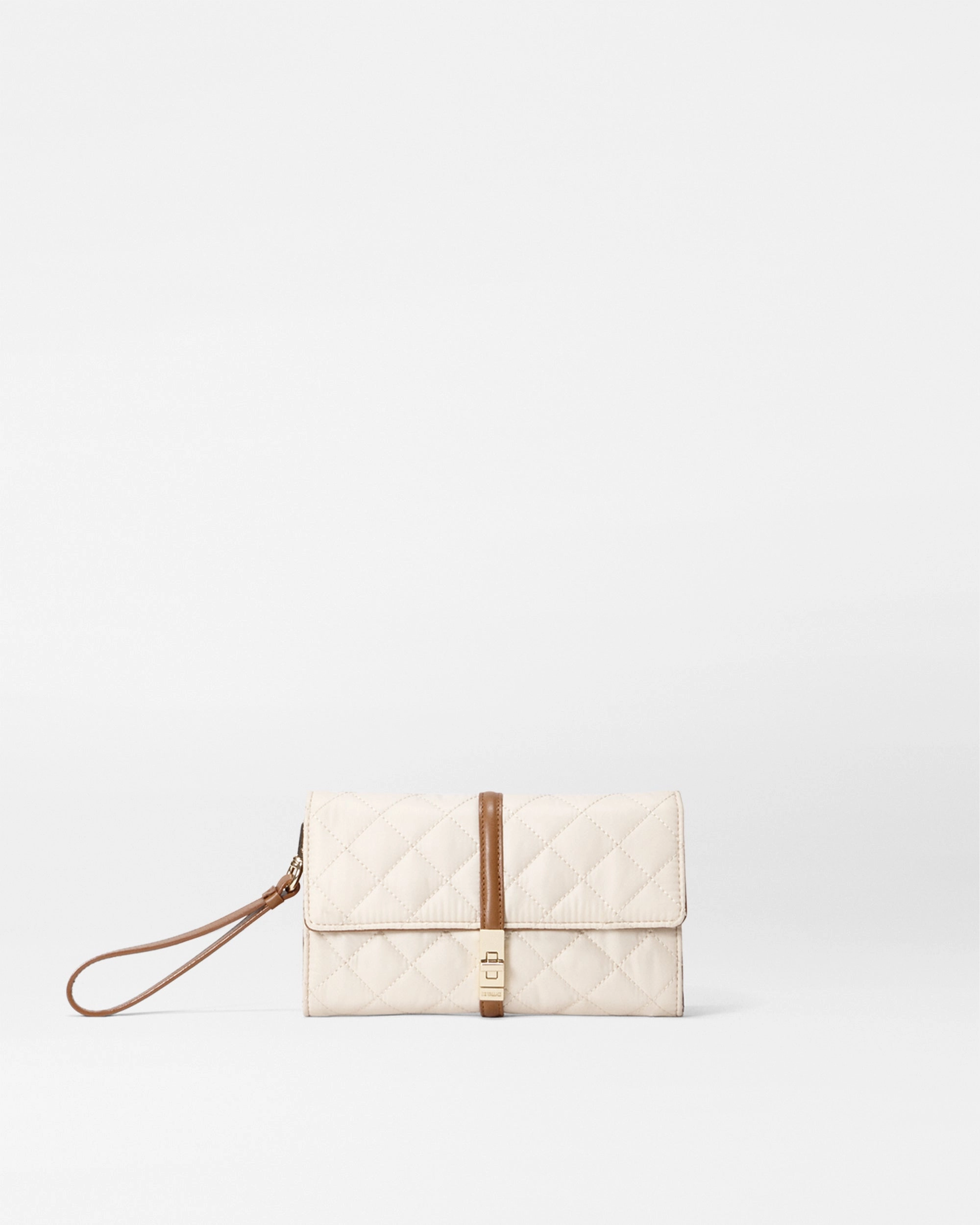 Sandshell with Brown Astor Convertible Crossbody (Fabric) Smart compartments make organizing your items easy and efficient Well-designed compartments help you keep your items sorted