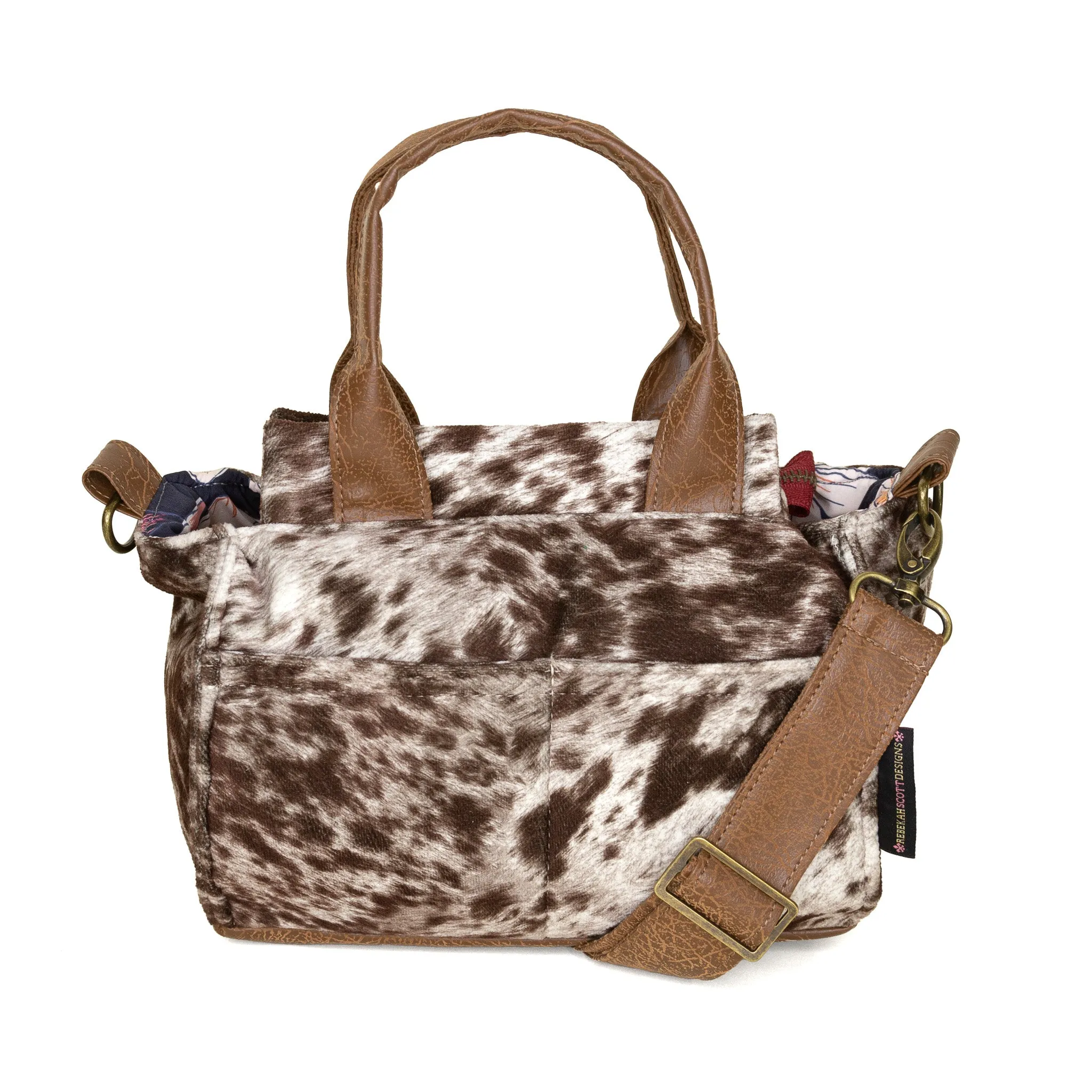 Sleek and minimalistic look complements any outfit Effortless Style Anita: Stampede Cowhide