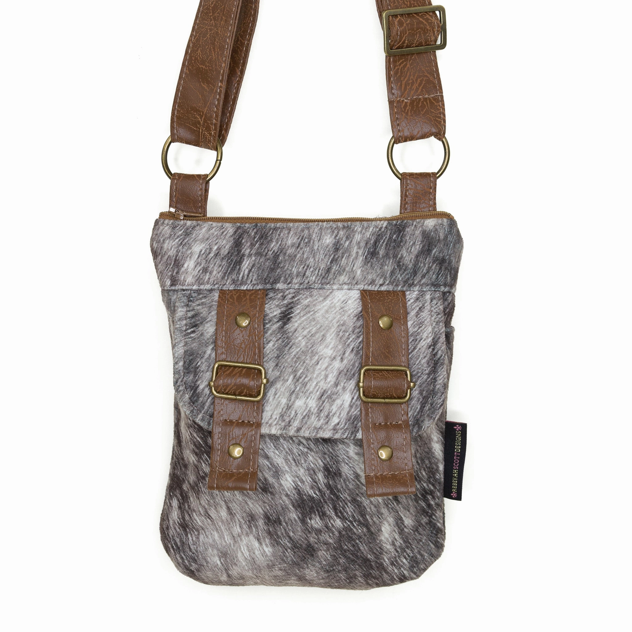 Erin: Roan Cowhide Perfect for both men and women who need a functional and stylish bag Tough and resilient materials to handle everyday wear and tear