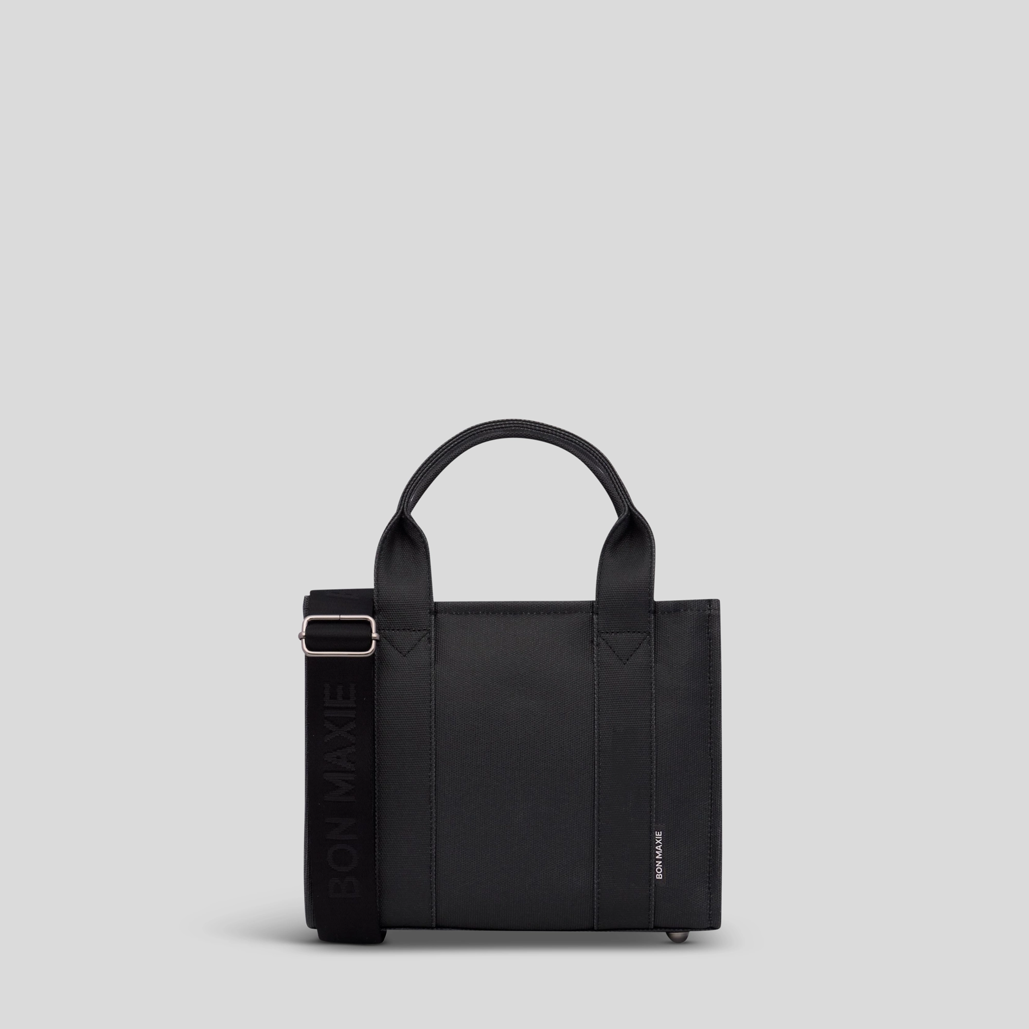 Trend Alert Micro Structured Tote Bag in signature coated canvas -- Black