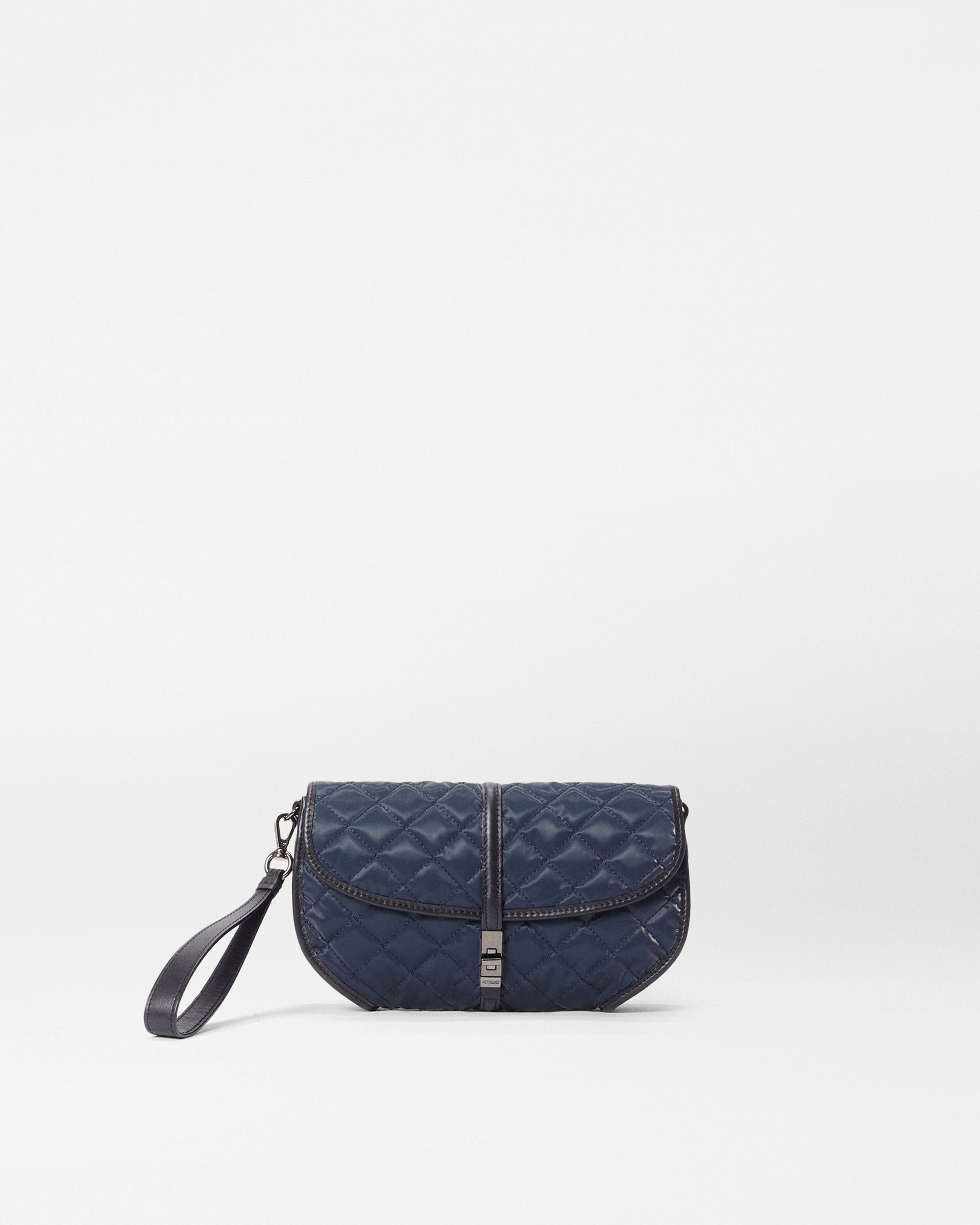 Lightweight Fashion Choice Compact yet spacious enough to fit your phone wallet and keys Ink Liquid Small Astor Convertible Clutch