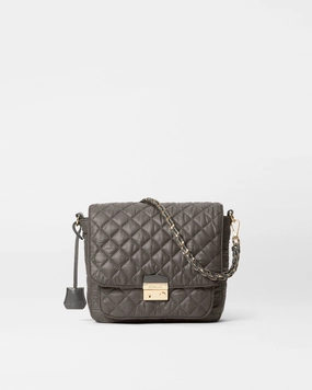 Comfortable design that provides hands-free convenience throughout the day Adjustable strap for a customized fit Magnet Medium Crosby Lock Crossbody