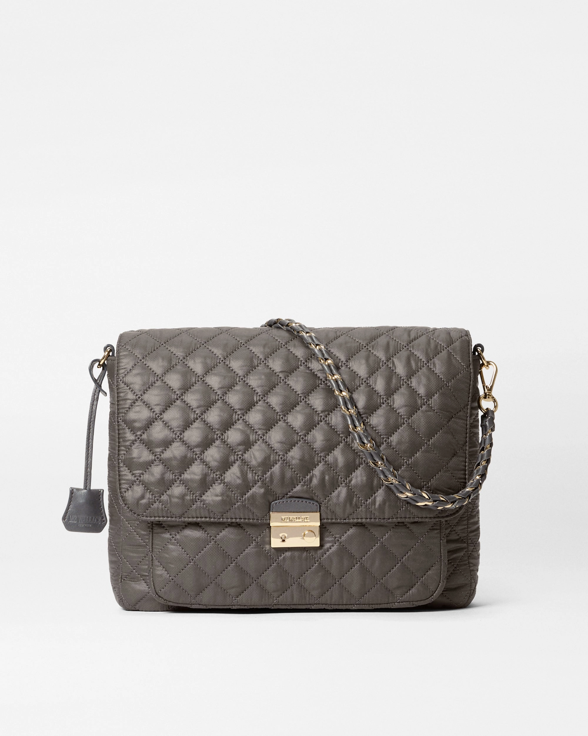 Magnet Large Crosby Lock Crossbody Compact Travel Essential Keeps you organized while offering a minimalist aesthetic