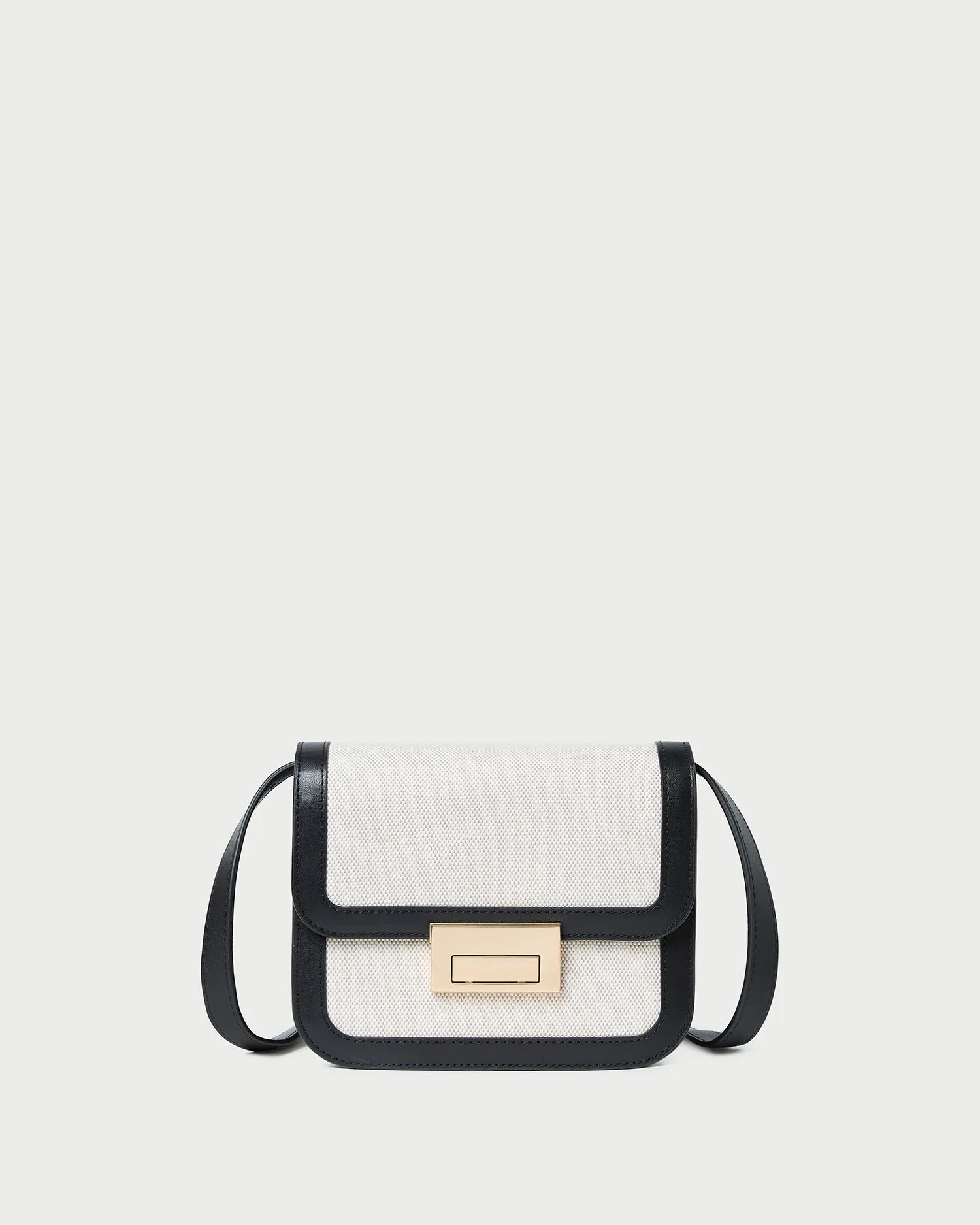 Minimalistic design that complements any outfit Desi Black/Natural Canvas Crossbody