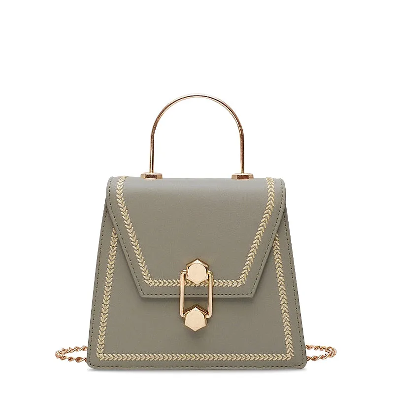 Durable materials that withstand daily wear Compact Urban Design The Amber Crossbody Bag