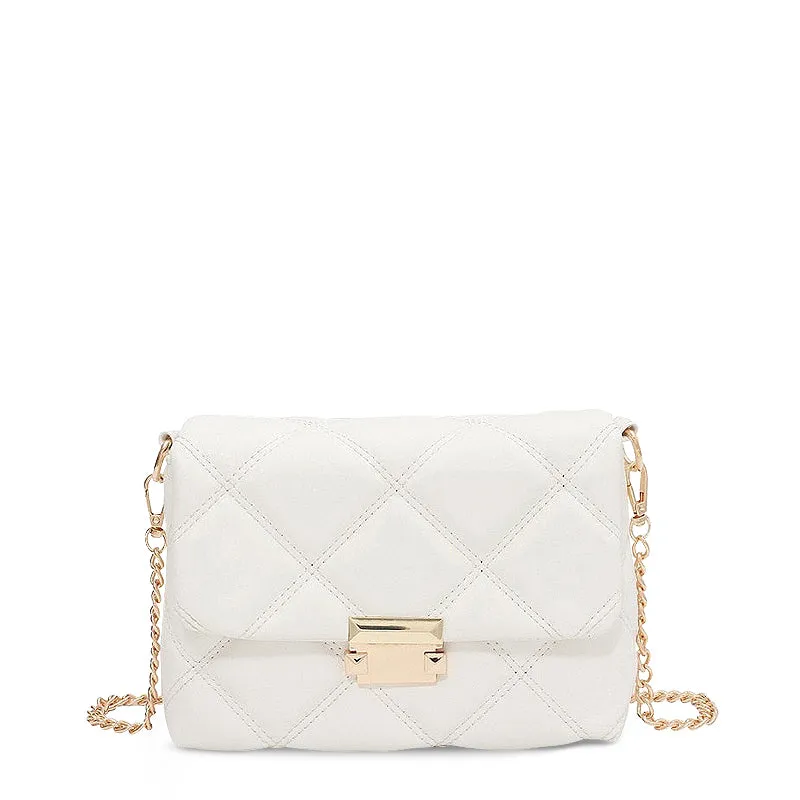 The Carly Crossbody Bag Comfortably fits all your essentials without feeling bulky