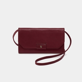 Romy Wallet Crossbody in Polished Leather - Saddleberry A bag that provides just the right amount of storage without feeling bulky Elegant and understated design complements all outfits